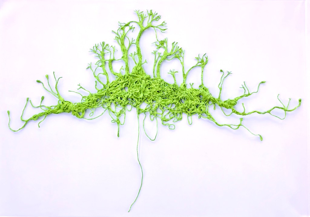An abstract sculpture made from thread by MJ Seal that resembles a forest of vines