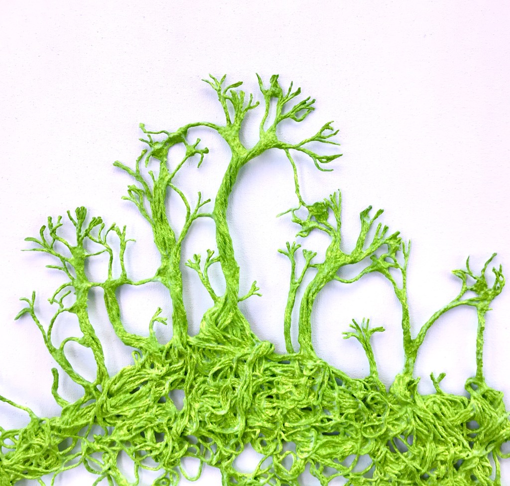 An abstract sculpture made from thread by MJ Seal that resembles a forest of vines